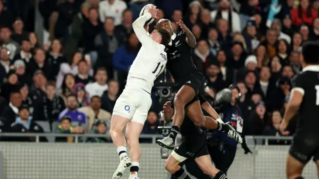 Tommy Freeman scores for England against New Zealand