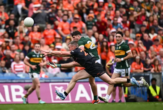 Kerry's Dylan Geaney fires over to take the game into extra-time