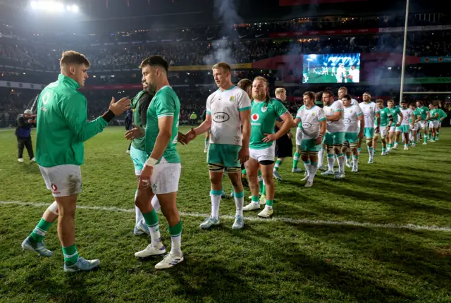 Irish and South African players shake hands at full-time