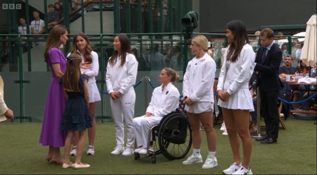 Princess of Wales and Princess Charlotte with tennis players