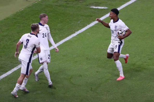 Palmer and Watkins celebrate with Shaw