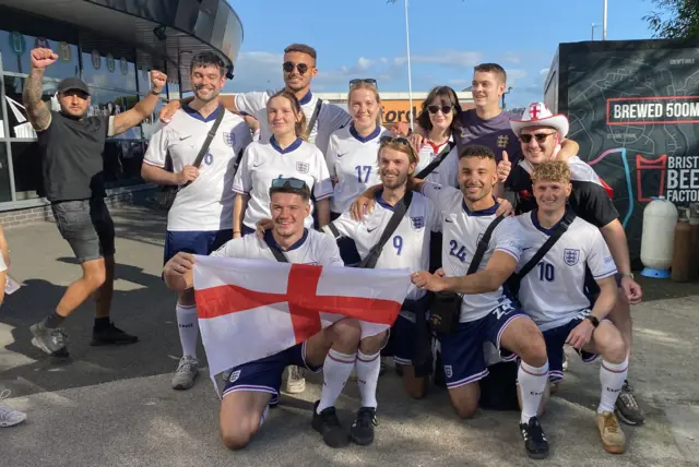 England fans pose witha flag outside ashton gate