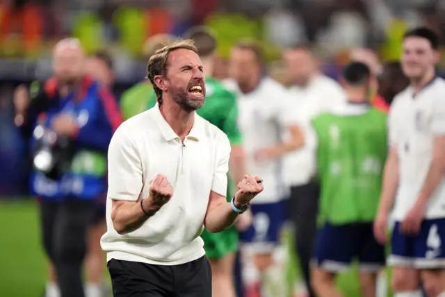 Gareth Southgate celebrates on the pitch at full-time at the end of the semi-final win over Holland