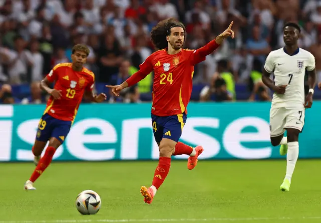 Cucurella points instructions to his teammates