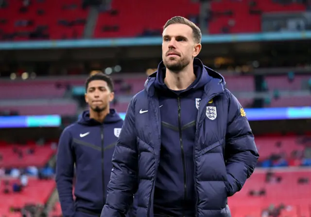 Jordan Henderson with Jude Bellingham in the background