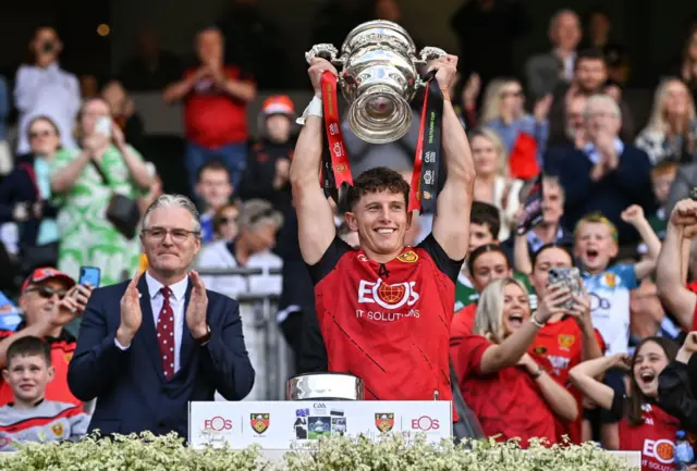 Down captain Pierce Laverty lifts the Tailteann Cup at Croke Park