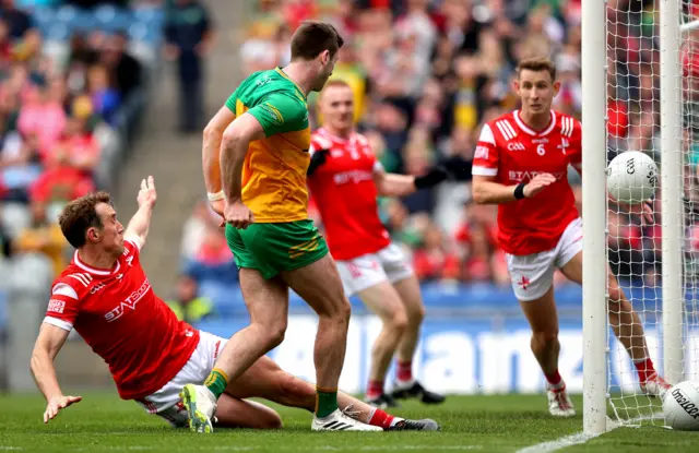 Eoghan Ban Gallagher hits the Louth net in last month's quarter-final