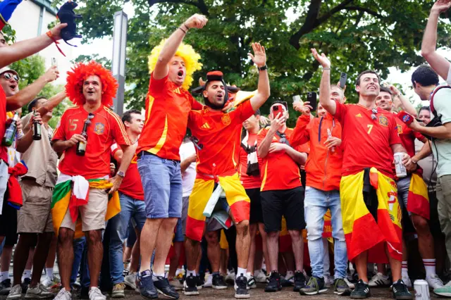 Spain fans sing and dance in Berlin