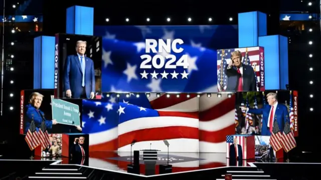 A view of the convention floor covered with pictures of Donald Trump