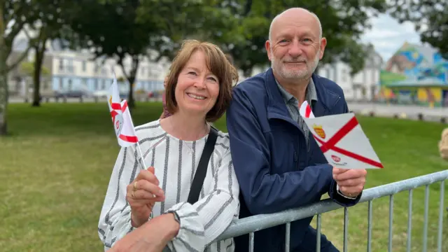 Couple with Jersey flags