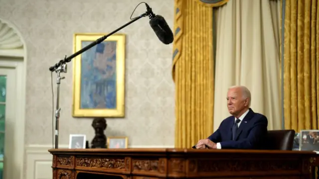 US President Joe Biden delivers a prime-time address to the nation in the Oval Office of the White House in Washington, DC, US, on Sunday, July 14, 2024. T