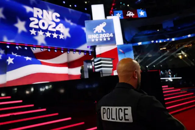 A police officer stands on the floor ahead of the Republican National Convention in Milwaukee