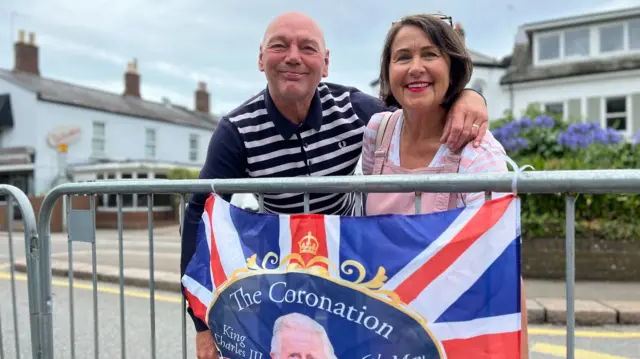 Two islanders lining a road in Jersey to see the royals