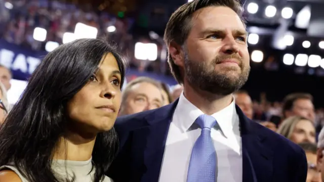 Usha Vance stands next to her husband, JD, at the Republican National Convention