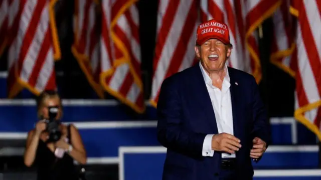 Republican presidential candidate and former U.S. President Donald Trump reacts during a campaign rally at his golf resort in Doral, Florida, U.S., July 9, 2024.