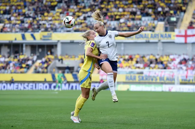 Beth Mead heads the ball above Lundkvist