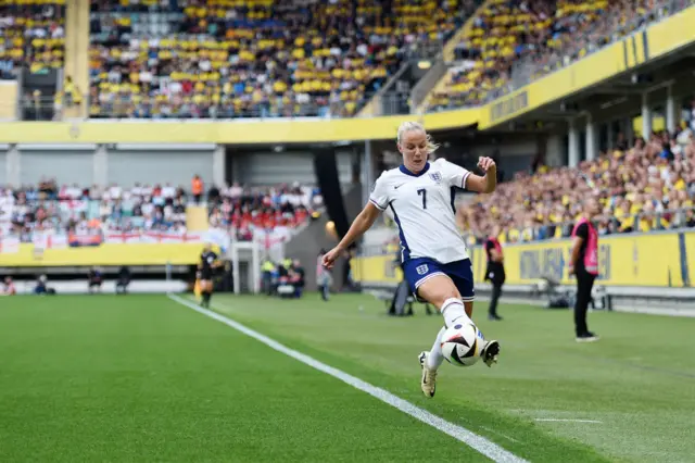 Mead reaches a ball on the touchline