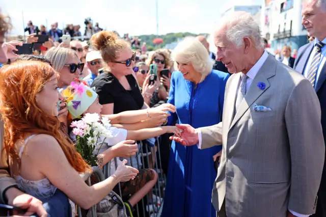 King Charles and Queen Camilla meeting people in Guernsey