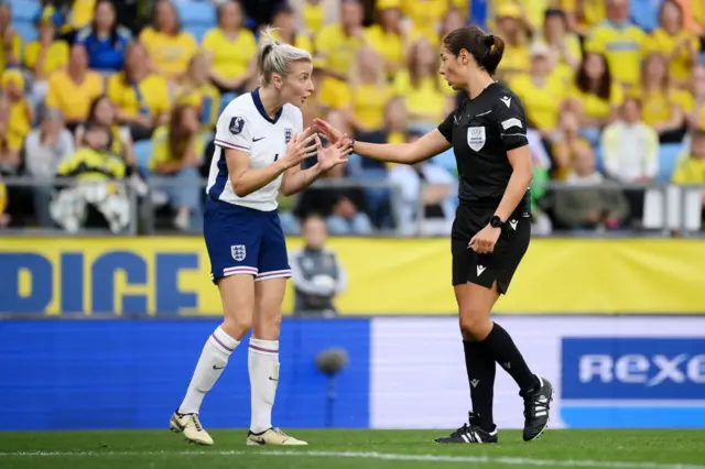 Williamson talks to the referee