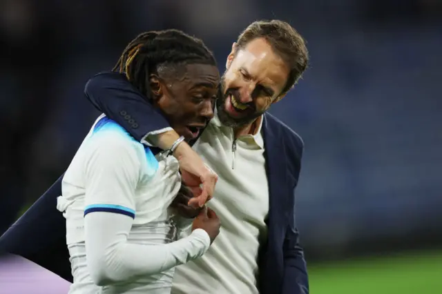 Eberechi Eze is hugged by Gareth Southgate