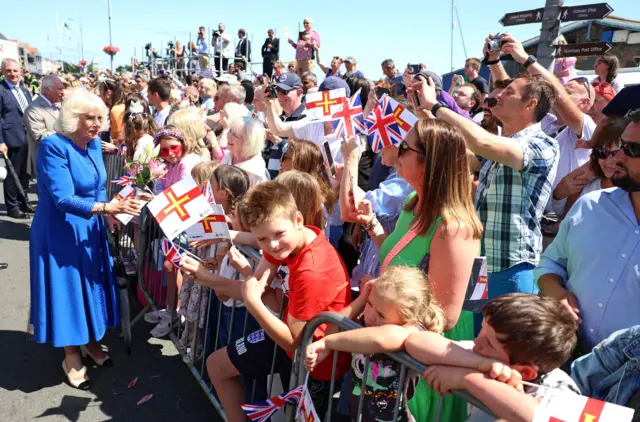 King Charles and Queen Camilla meeting people in Guernsey