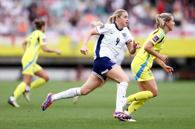 Russo runs after the ball in the middle