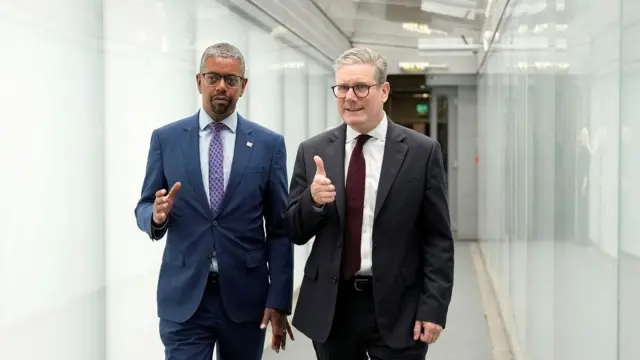 Gething and Starmer walk side by side during the election campaign