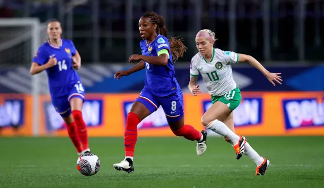 Denise O'Sullivan chases French midfielder Grace Geyoro