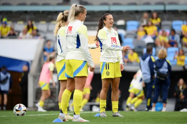 Sweden players line up for shooting practice