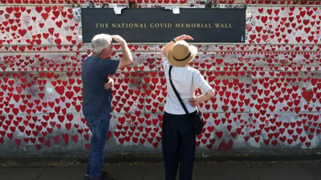 People view messages written on the National Covid Memorial Wall as the UK COVID-19 Inquiry starts to hear evidence, in London, Britain, June 14, 2023