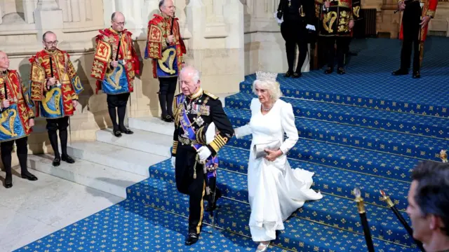 King Charles III and Queen Camilla wearing the Diamond Diadem depart the Houses of Parliament,