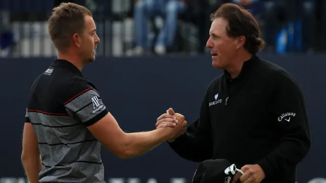 Phil Mickelson shakes hands with Henrik Stenson