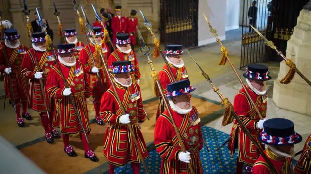 The King's Bodyguard, the Yeomen of the Guard, arrives at the Sovereign's Entrance to the Palace of Westminster ahead of the State Opening of Parliament in the House of Lords, London. Picture date: Tuesday November 7, 2023.