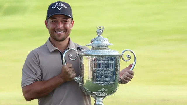 Xander Schauffele holds the US PGA Championship trophy