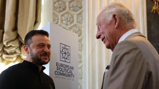 Volodymr Zelensky speaking with King Charles