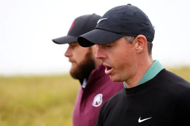 Tyrrell Hatton (left) and Rory McIlroy (right)