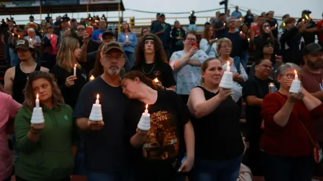 Supporters holding candles