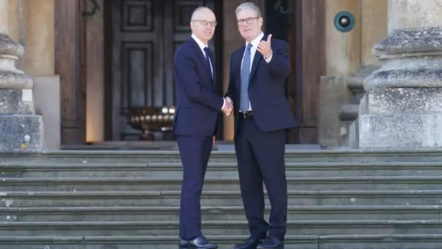 Prime Minister of Luxembourg Luc Frieden shaking hands with Keir Starmer