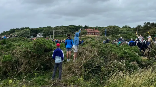 Fans trying to get a view of the 11th tee at Royal Troon