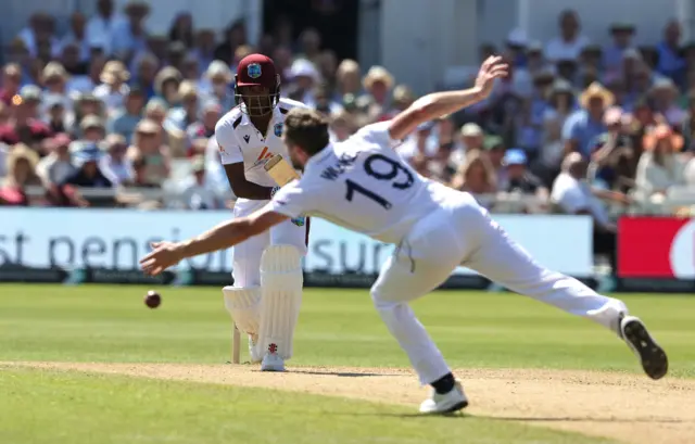 Kraigg Brathwaite plays a shot past Chris Woakes