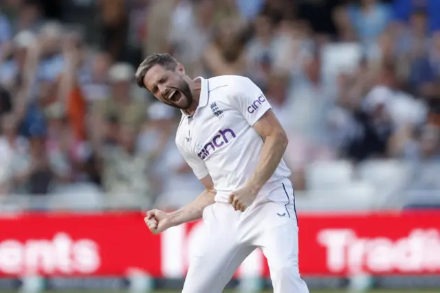 Chris Woakes celebrates his wicket of Kavem Hodge