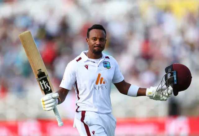 West Indies' Kavem Hodge walks after losing his wicket