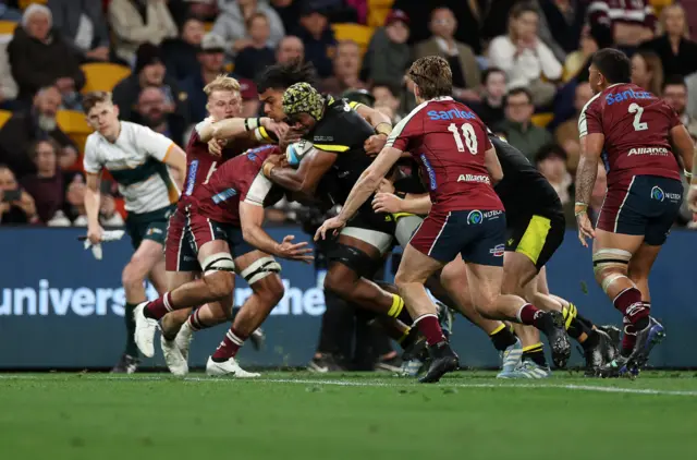 Christ Tshiunza of Wales scores a try