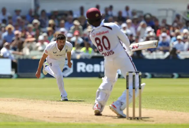 Mark Wood bowling at Trent Bridge v West Indies