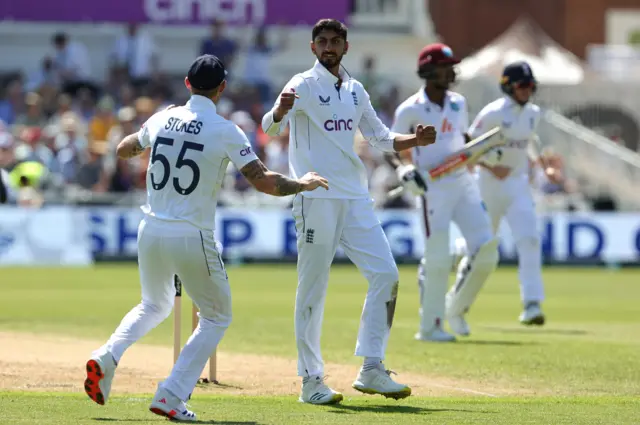 Shoaib Bashir celebrates a wicket with Ben Stokes