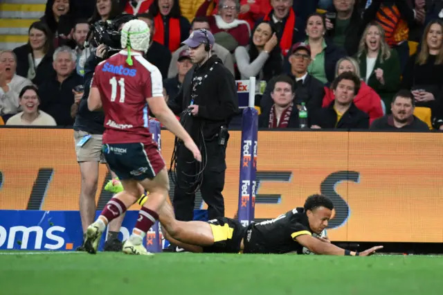 Wales' Regan Grace scores a try