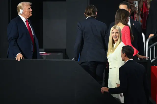 Republican presidential candidate, former U.S. President Donald Trump looks on as Ivanka Trump, daughter of former U.S. President Donald Trump, and Jared Kushner, son-in-law of former U.S. President Donald Trump, arrive on the fourth day of the Republican National Convention