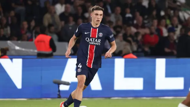 Manuel Ugarte #4 of Paris Saint-Germain controls the ball during the Ligue 1 Uber Eats match between Paris Saint-Germain and Toulouse FC at Parc des Princes on May 12, 2024 in Paris, France.