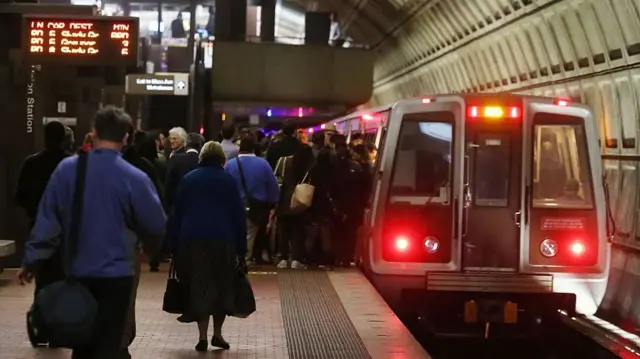 Passengers getting on a Metrolink train in Washington DC