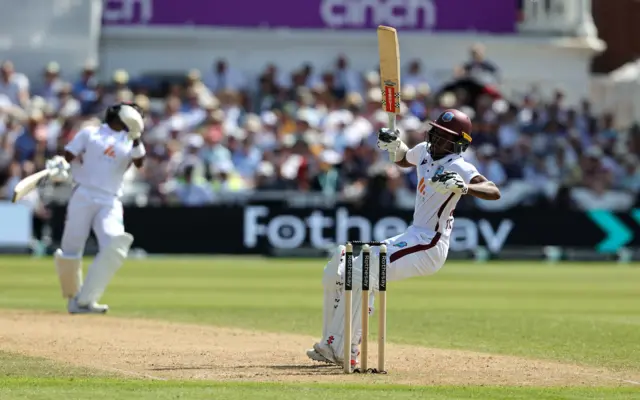 Alick Athanaze of the West Indies is struck on the helmet by a Mark Wood delivery during Day two of the 2nd Test Match between England and the West Indies at Trent Bridge